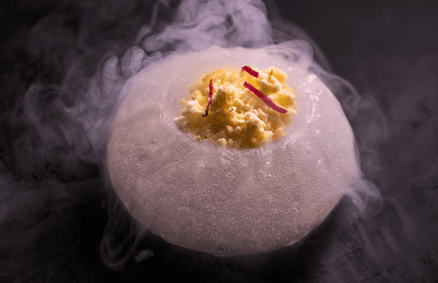 A creative dish from one of the best chefs in the world in 2025, showcasing molecular gastronomy techniques seen among Michelin-star chefs by country and region.