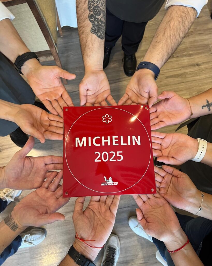 Team at Mantua Restaurante celebrating their Michelin star 2025 award, a recognition of world-class culinary excellence.